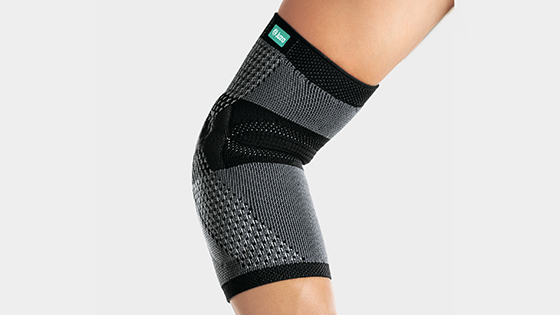A hiker is wearing a Juzo elbow support A hiker is wearing a Juzo elbow support