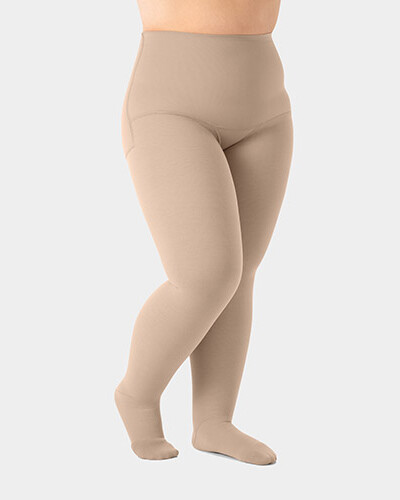 Juzo Expert Kompressionsstrumpfhose Beinpartie einer Person, die den Juzo Expert als Kompressionsstrumpfhose trägt und leicht seitlich steht.