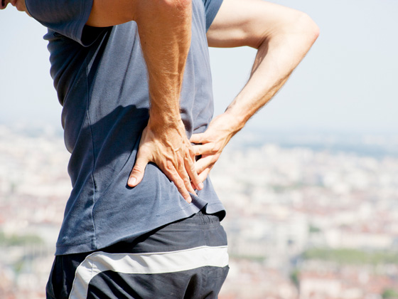 Back pain Man with back pain