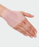 Woman using Juzo ScarPad on the hand