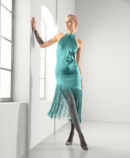 2. Immagine Lifestyle Juzo Inspiration Donna con Juzo Inspiration e collant in abito color papavero e petrolio