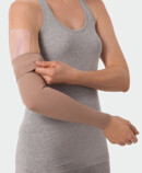 Woman using Juzo ScarPad on the arm