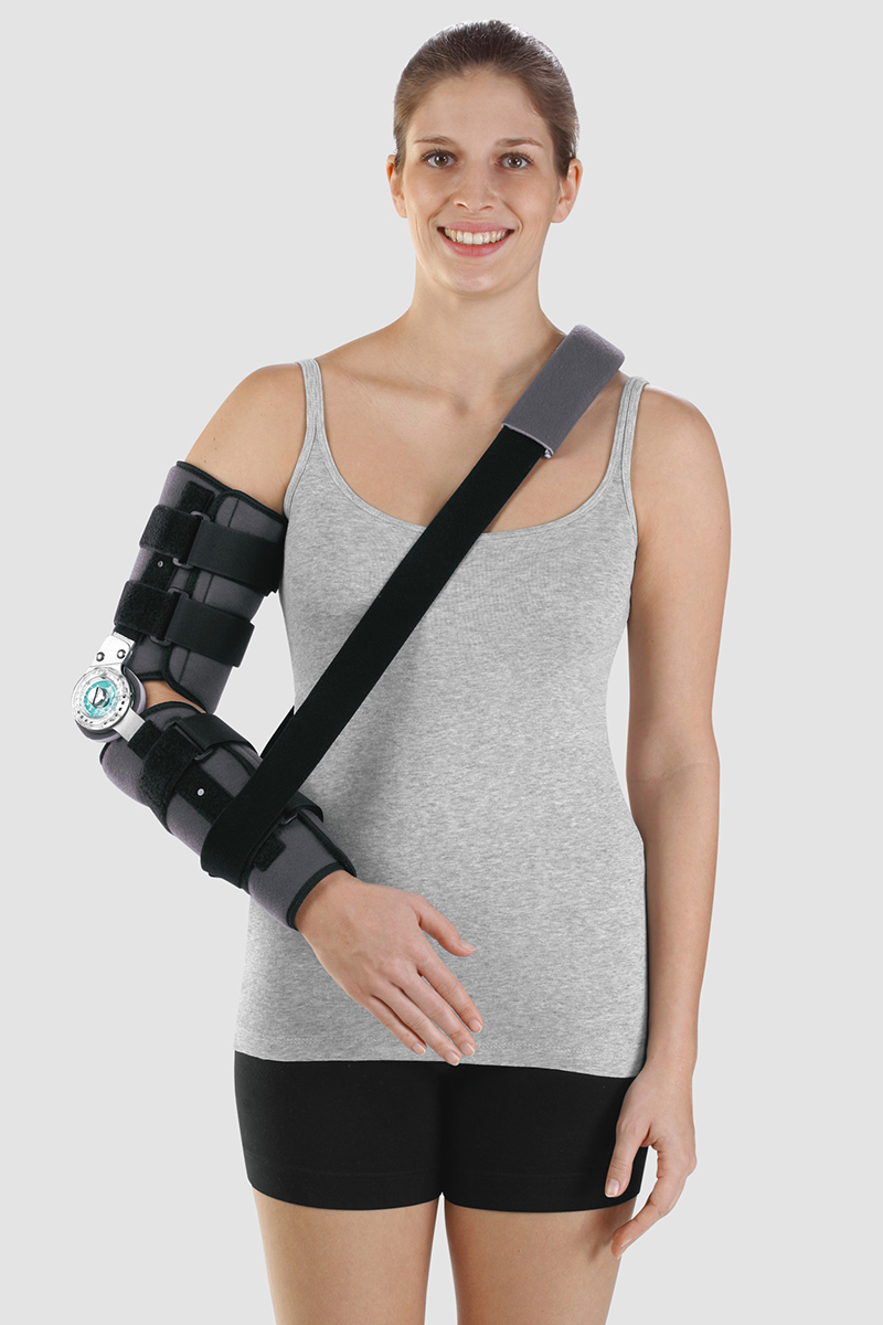 JuzoPro orthoses for your ellbow A woman wears an elbow orthosis